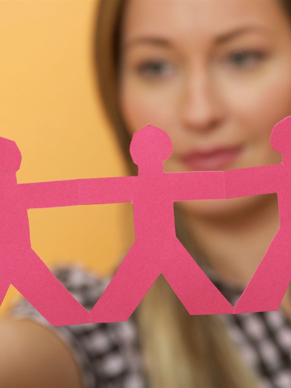 Paper chain of figures representing safeguarding